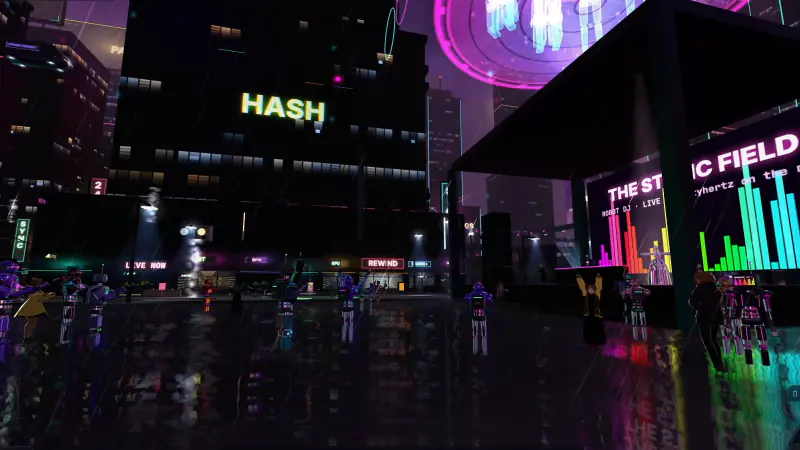 Robots dancing on a wet square in front of a stage called The Static Field, coloured equaliser bars on its screen, the Hash tower behind.